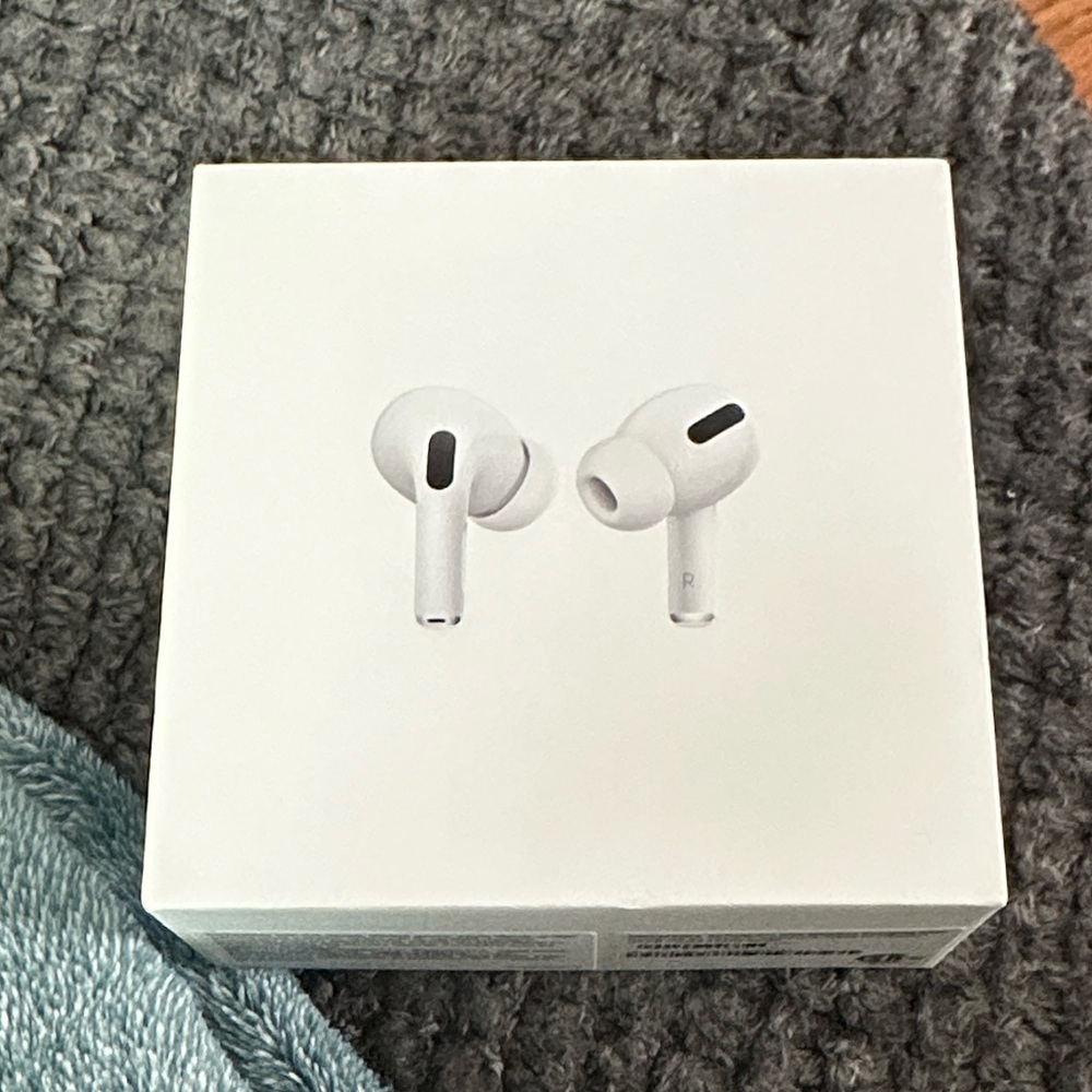 Empty Apple AirPods Pro with White MagSafe Case